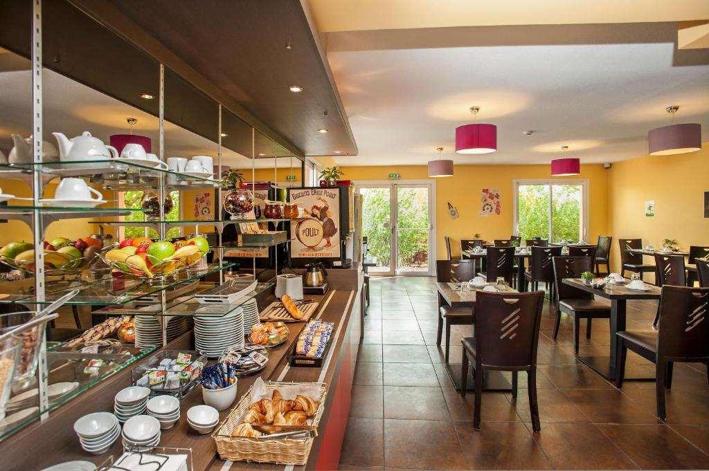 Brit Hotel Confort Villeneuve Sur Lot Bias  ร้านอาหาร รูปภาพ